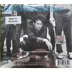 TOM WAITS – rain dogs